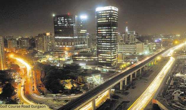 Night view of Golf Course Road in Gurgaon, highlighting its surroundings and infrastructure.